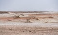 Hills of chalk and limestone and slopes of multi-colored mountains with weathering and washouts from water Royalty Free Stock Photo