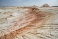 Hills of chalk and limestone and slopes of multi-colored mountains with weathering and washouts from water Royalty Free Stock Photo