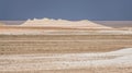 Hills of chalk and limestone and slopes of multi-colored mountains with weathering and washouts from water Royalty Free Stock Photo