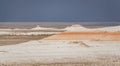 Hills of chalk and limestone and slopes of multi-colored mountains with weathering and washouts from water Royalty Free Stock Photo