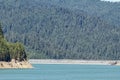 The Hills Creek Dam seen across the reservoir in the Willamette National Forest near Oakridge, Oregon, USA