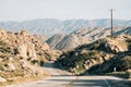 Hills and desert landscape along a road in Pioneertown, California Royalty Free Stock Photo