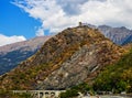 Hills of the Italian Alps with old castle on top Royalty Free Stock Photo