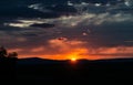 Hills landscape with sunset and clouds Royalty Free Stock Photo