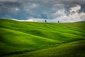 Hills like waves with cloudy sky