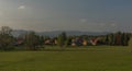 Hills over Trojanovice village in spring sunny color evening