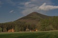 Hills over Trojanovice village in spring sunny color evening