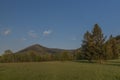 Hills over Trojanovice village in spring sunny color evening