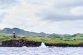 Hills of Sabtang Island with Lighthouse fronting the shore at, Batanes, Philippines