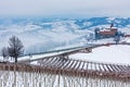 Hills and vineyards covered in snow in Italy. Royalty Free Stock Photo