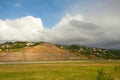 A hillside in the caribbean cut to accommodate a runway