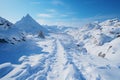 Hillside journey Snow covered footprints trace human climb amid serene snowy terrain