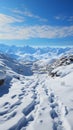 Hillside journey Snow covered footprints trace human climb amid serene snowy terrain