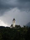 Hilltop church Chiesa di Santa Maddalena with Dolomites mountain panorama in Versciaco Vierschach South Tyrol Italy alps