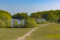 Hilltop View to a Fresh Water Pond in Spring Royalty Free Stock Photo