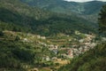 Hilly landscape covered by terraced fields with roofs Royalty Free Stock Photo