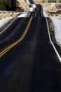 Hilly Road Transportation and Travel Double Yellow Lines Roadway Hills Royalty Free Stock Photo