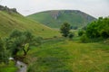 Hilly valley. Background with selective focus and copy space Royalty Free Stock Photo