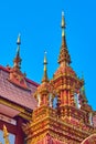 The towers and hti umbrellas of Wat Saen Muang Ma, Chiang Mai, Thailand Royalty Free Stock Photo