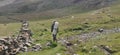 Himachal, India - July 10th, 2022 : Man with trekking bag in the mountain, summer hike with backpacks, himalayan view