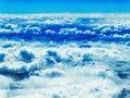 Aerial view of mountains and clouds on top Royalty Free Stock Photo
