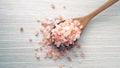 Himalaya pink salt in a wooden spoon Royalty Free Stock Photo