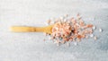 Himalaya pink salt in a wooden spoon Royalty Free Stock Photo