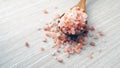 Himalaya pink salt in a wooden spoon Royalty Free Stock Photo