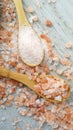 Himalaya pink salt in wooden spoons Royalty Free Stock Photo