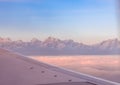 Himalayan mountain range during dusk seen from flight