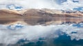 Himalayan mountains mirrored reflected in Tso Moriri mountain Lake water surface near Karzok or Korzok village in the Leh district