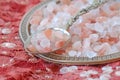 Himalayan pink salt on indian carpet Royalty Free Stock Photo