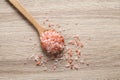 Himalayan pink salt in wooden spoon Royalty Free Stock Photo