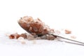 Cristals of himalayan salt close up on teaspoon