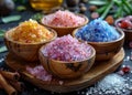 Himalayan salts sea salt and pink salt in wooden bowls on wooden table Royalty Free Stock Photo