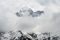 Himalayan summit emerging from the clouds Royalty Free Stock Photo