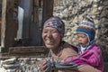 Portrait nepalese mother and child in a mountain village, Nepal, close up