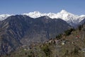 Himalayan village Sarahan situted in a valley of snowcapped mountains Royalty Free Stock Photo