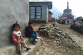 Portrait nepalese children near their house, on the street in Himalayan village, Nepal