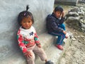 HIMALAYAS, EVEREST REGION, NEPAL - OCTOBER 20, 2010 : Portrait nepalese children near their house, on the street in Himalayan