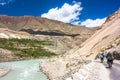 Himalayas landscape with two cyclist, mountains