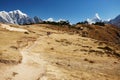 Himalayas mountain landscape. A steep snowy peak and a vast valley on a beautiful sunny day.