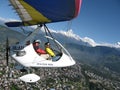 HIMALAYAS, POKHARA, NEPAL. 28 September 2008: Foreign tourist flying on a hang glider deltaplan.