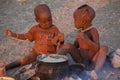 Himba children eating Royalty Free Stock Photo