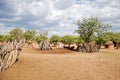 Himba village with traditional huts near Etosha National Park in Namibia