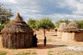 Himba village with traditional huts near Etosha National Park in Namibia