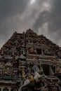 Hindu beautiful temple with many details isolated over cloudy sky background