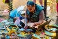 Hindu Brahmin providing ceremony at Swayambhunath Stupa.