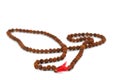 Hindu and buddhist prayer beads garland on white