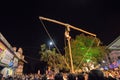 Hindu devotee hanging from pole for Charhak festival, for welcoming Bengali new year 1424.